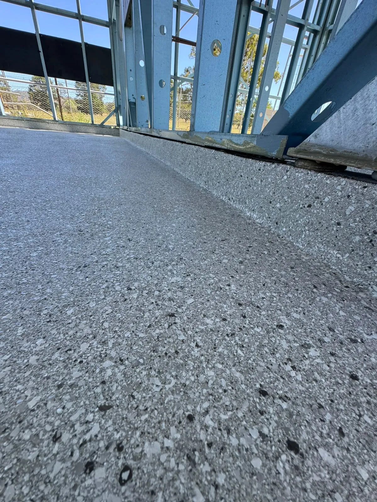 Decorative flake epoxy floor in a new-build property