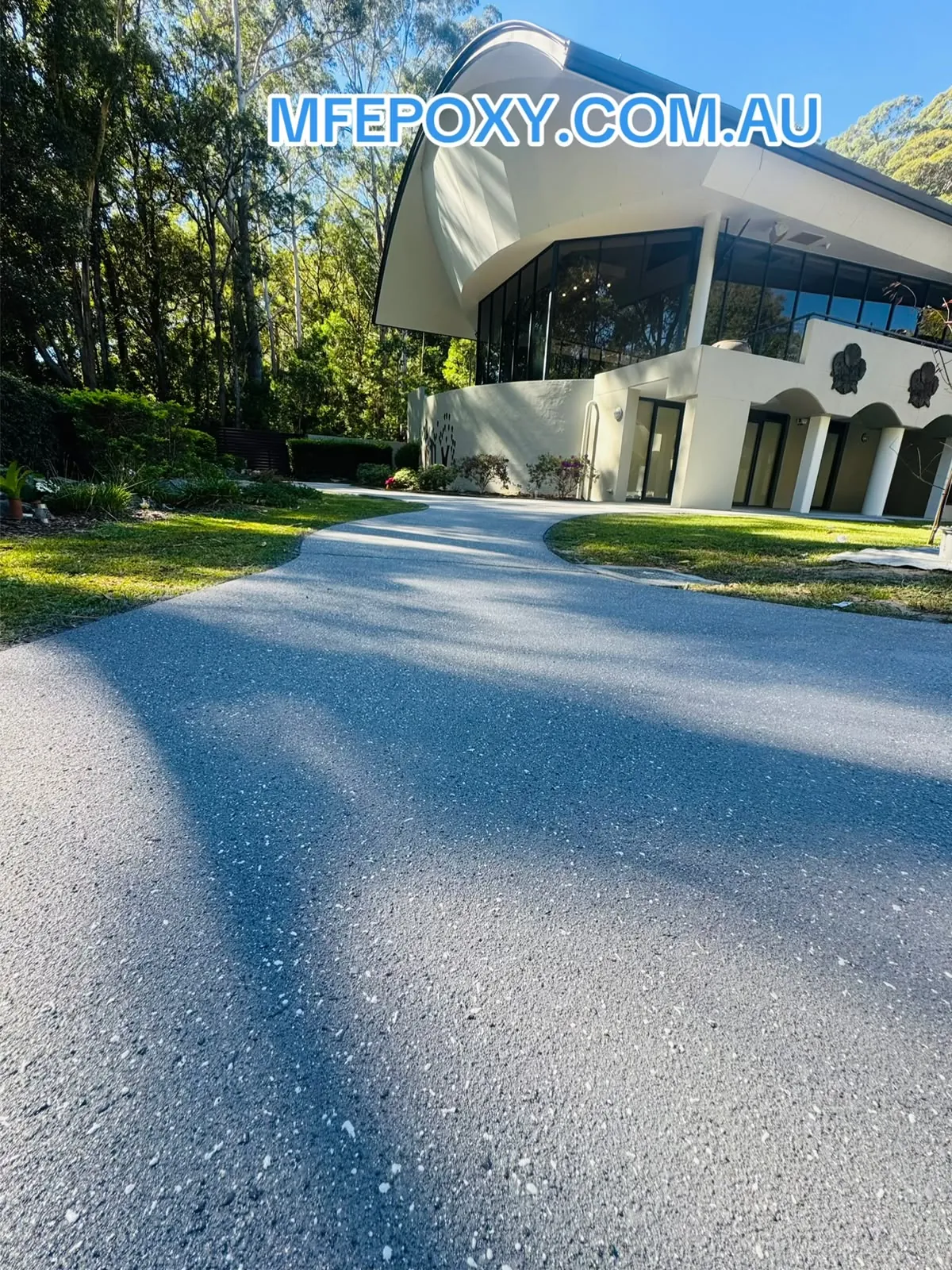 Decorative spraycrete driveway at a commercial building